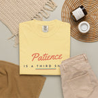Patience Is a Third Shot Tee in Butter, flat lay