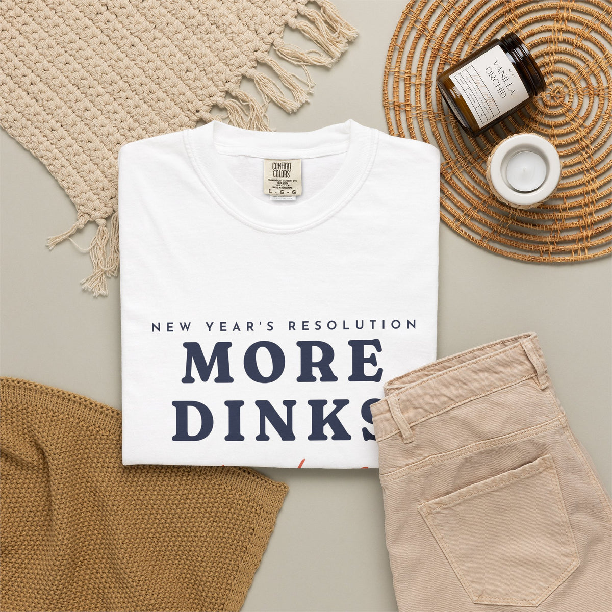 More Dinks Tee in White, flat lay