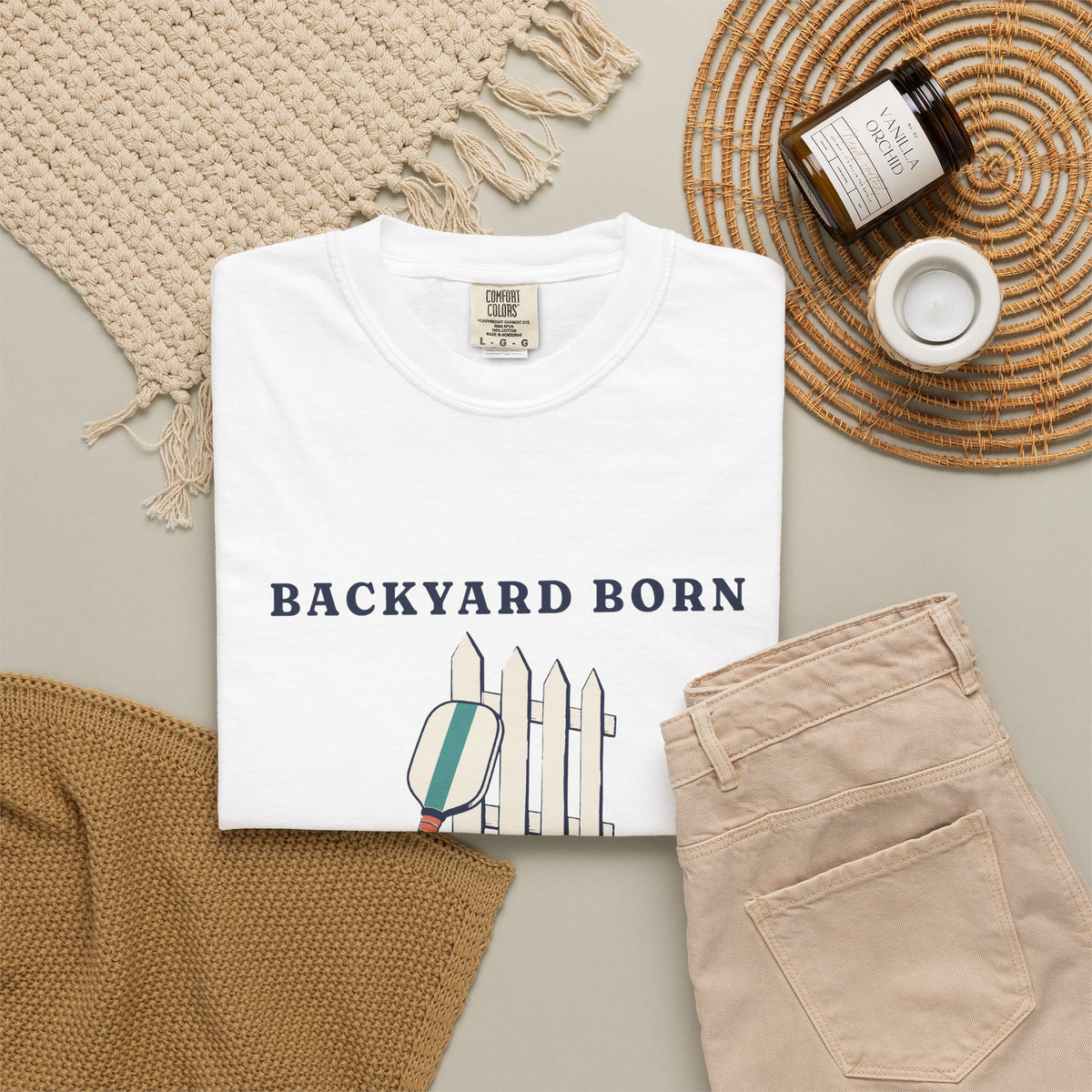 Backyard Born Tee in White, flat lay