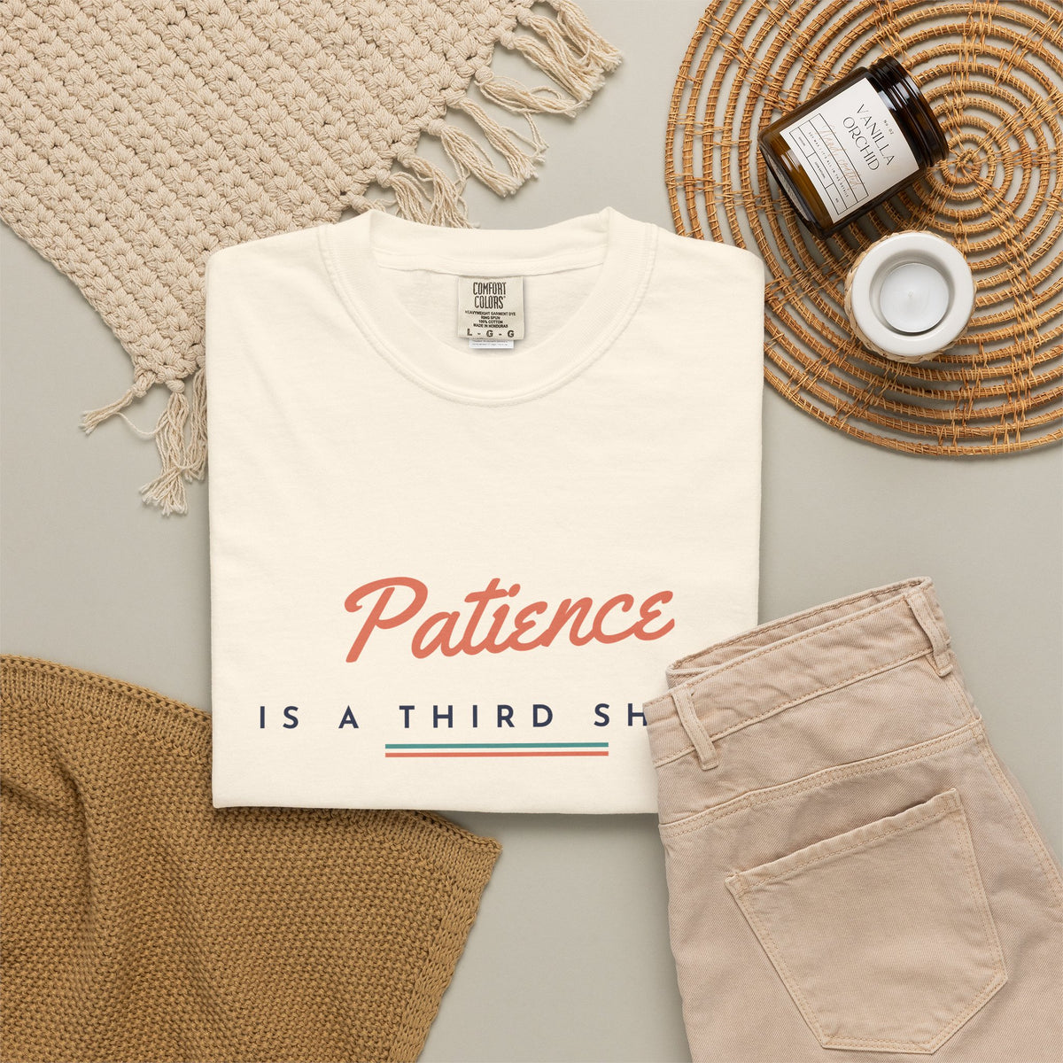 Patience Is a Third Shot Tee in Ivory, flat lay