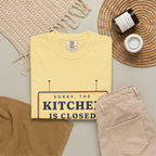 Kitchen Closed Tee in Butter, flat lay
