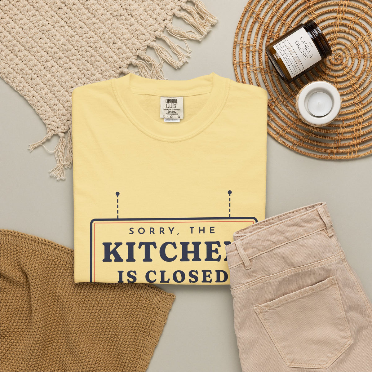 Kitchen Closed Tee in Butter, flat lay