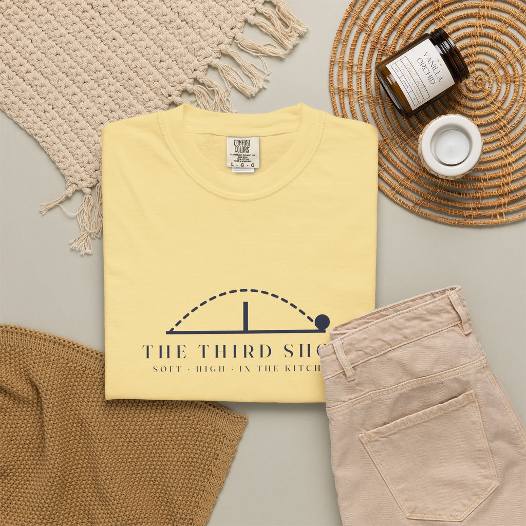 The Third Shot Tee in Butter, flat lay
