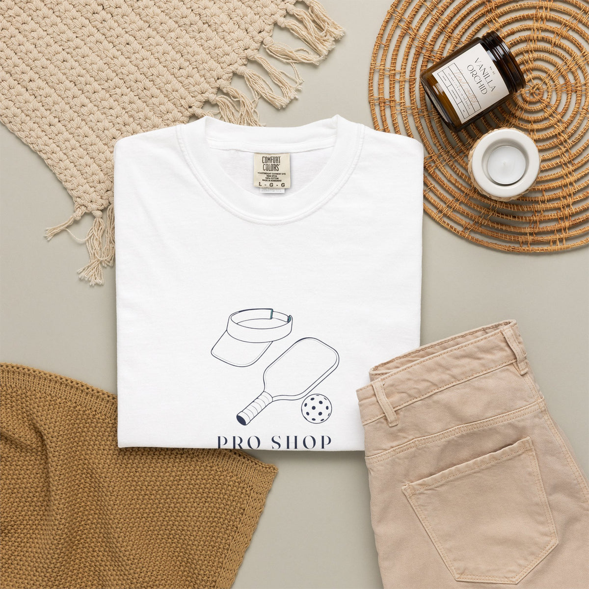 Pro Shop Still Life Tee in White, flat lay
