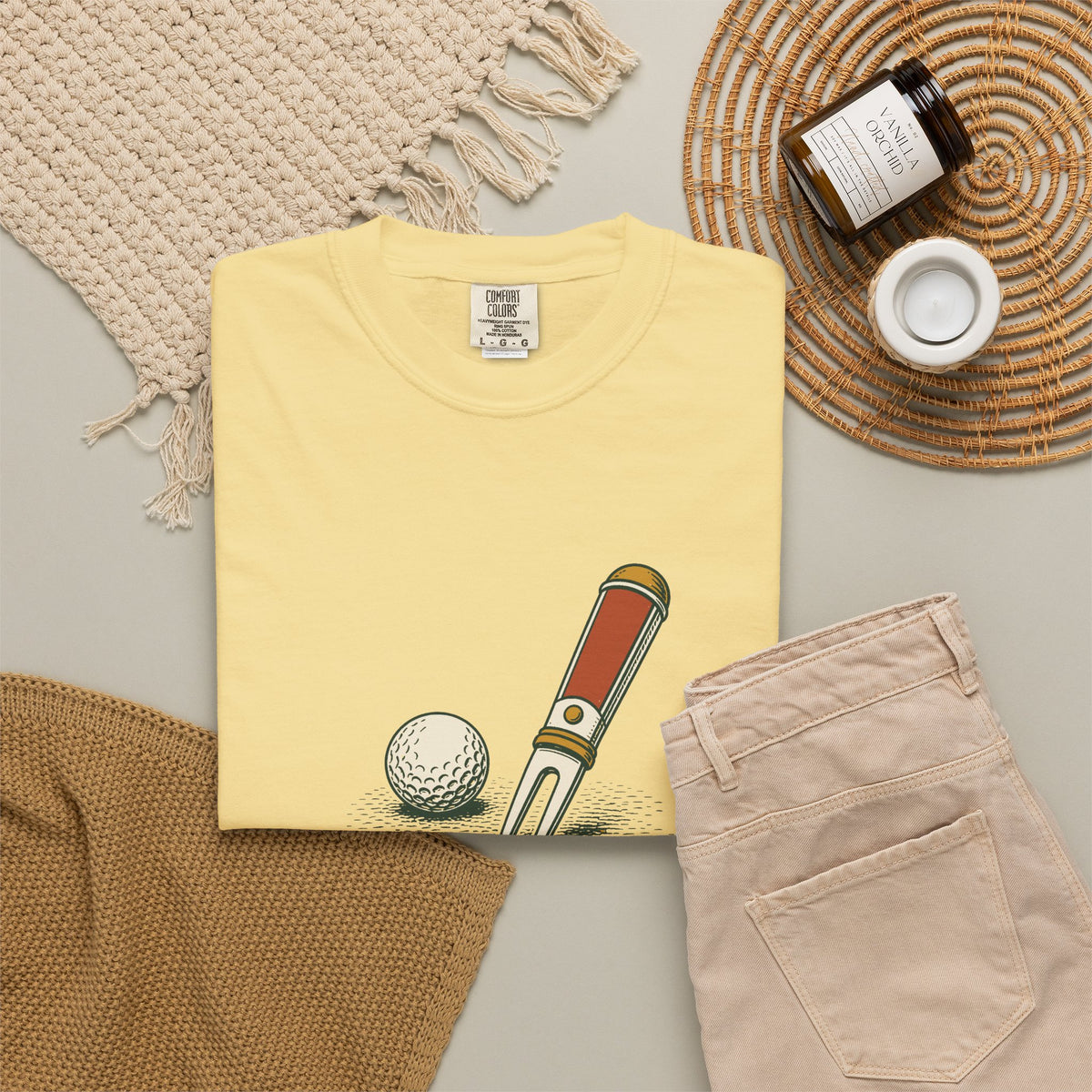 Fix Your Ball Marks Tee in Butter, flat lay