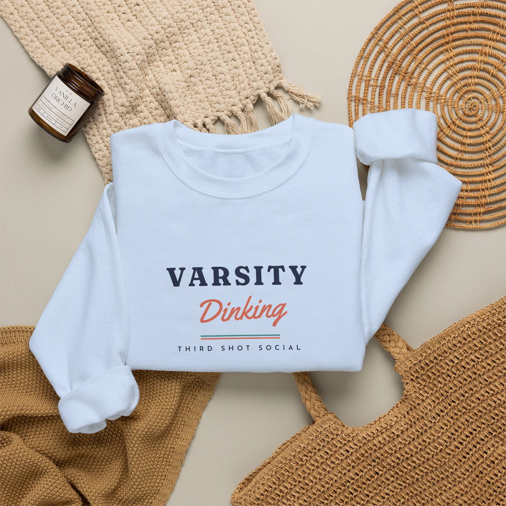 Varsity Dinking Crewneck in Light Blue, flat lay