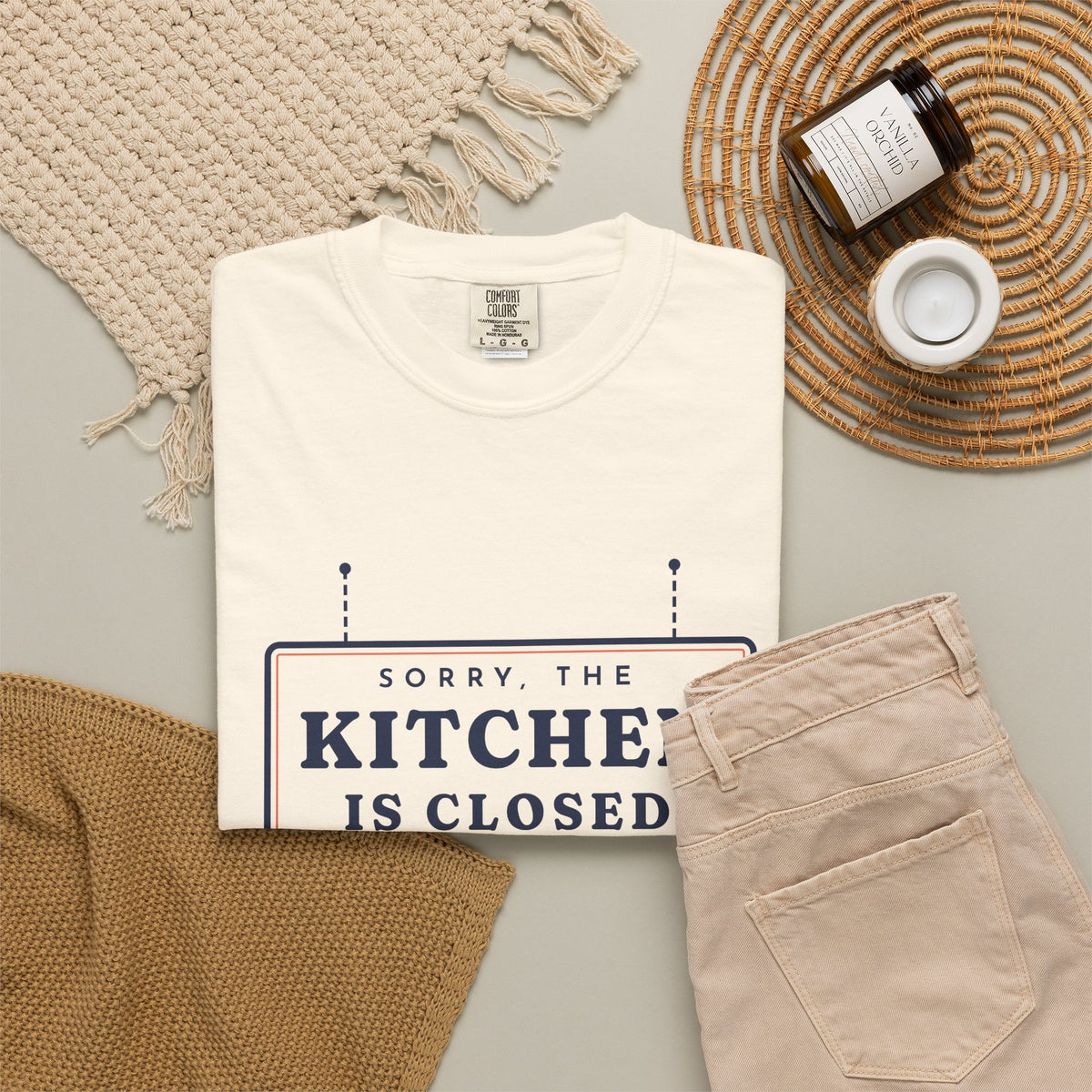 Kitchen Closed Tee in Ivory, flat lay
