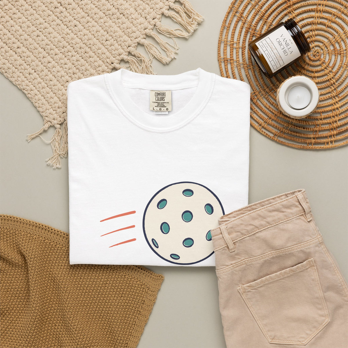 The Hole Story Tee in White, flat lay