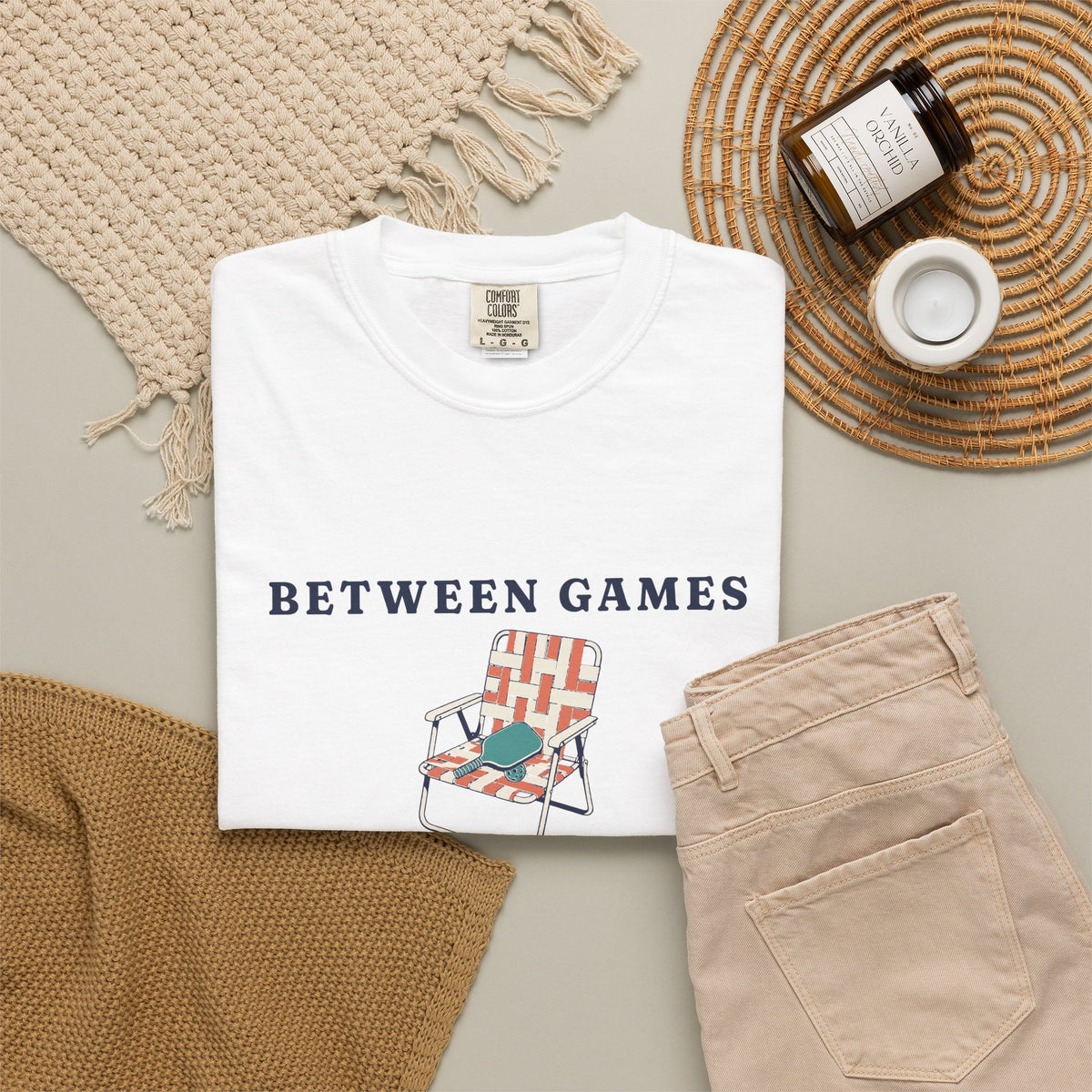 Between Games Tee in White, flat lay
