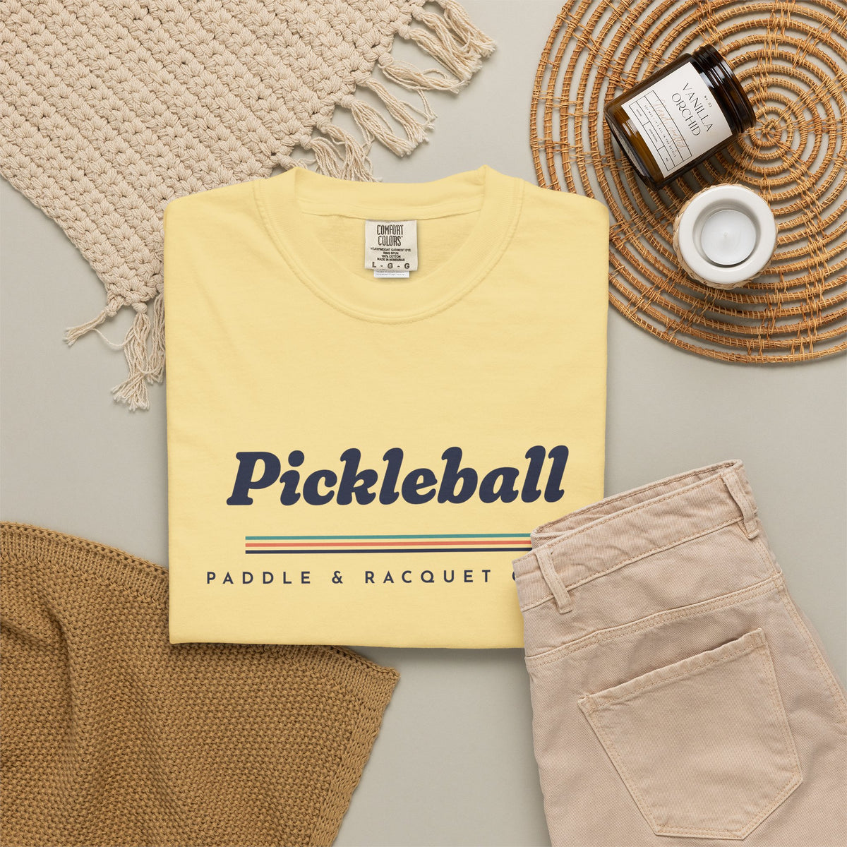 Pickleball Italic Tee in Butter, flat lay
