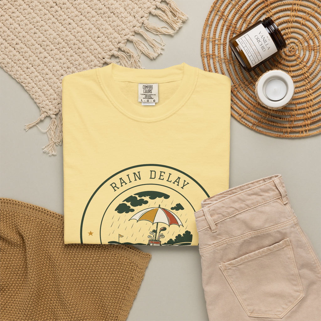 Rain Delay Tee in Butter, flat lay