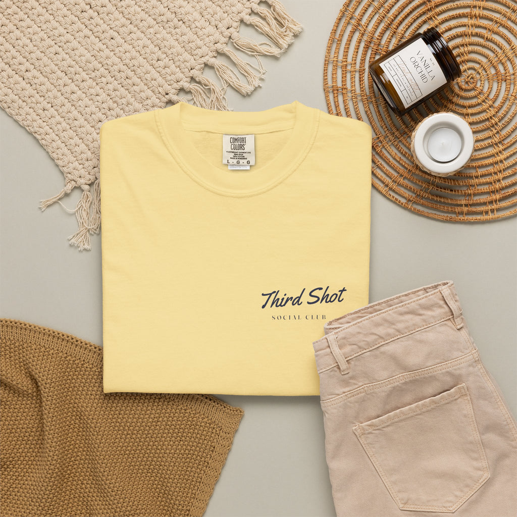 Script Chest Mark Tee in Butter, flat lay