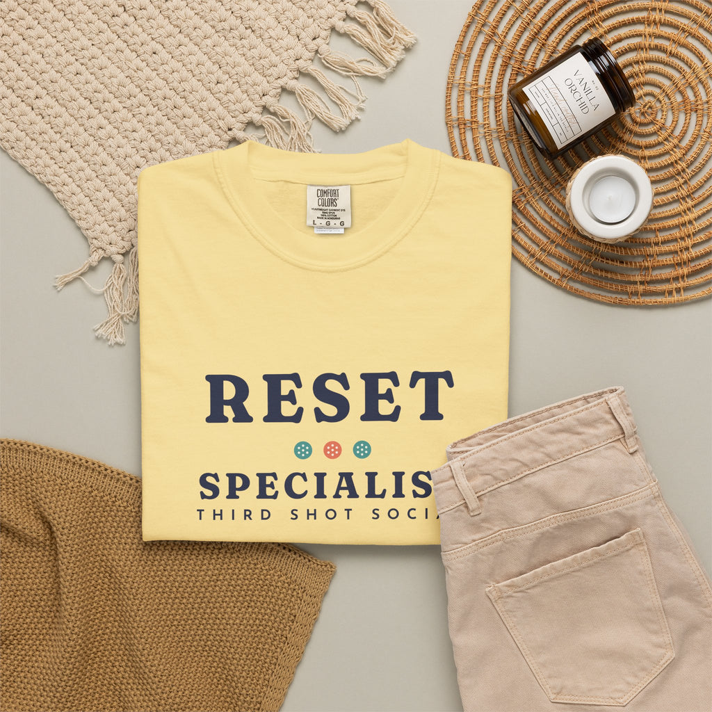 Reset Specialist Tee in Butter, flat lay