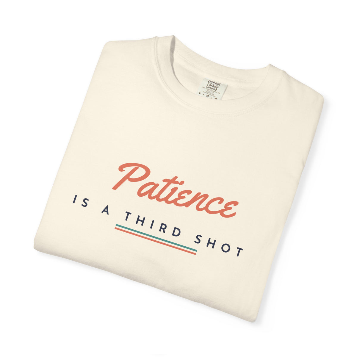 Patience Is a Third Shot Tee in Ivory, folded