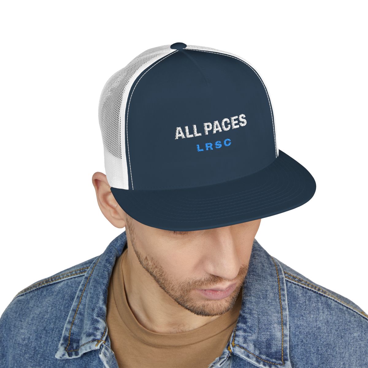 All Paces Trucker Cap in Navy/White, on model