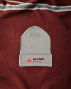 Alpine Division Beanie in Heather Grey, styled