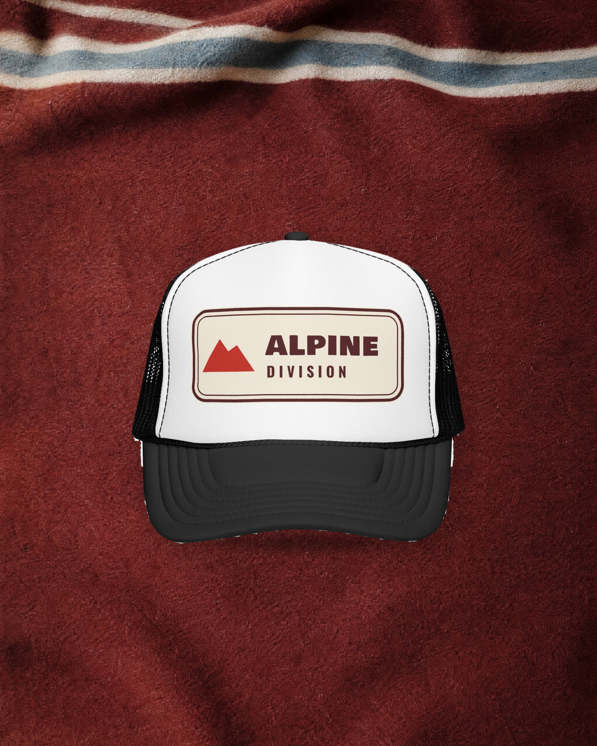 Alpine Division Trucker Hat in Black/White, styled