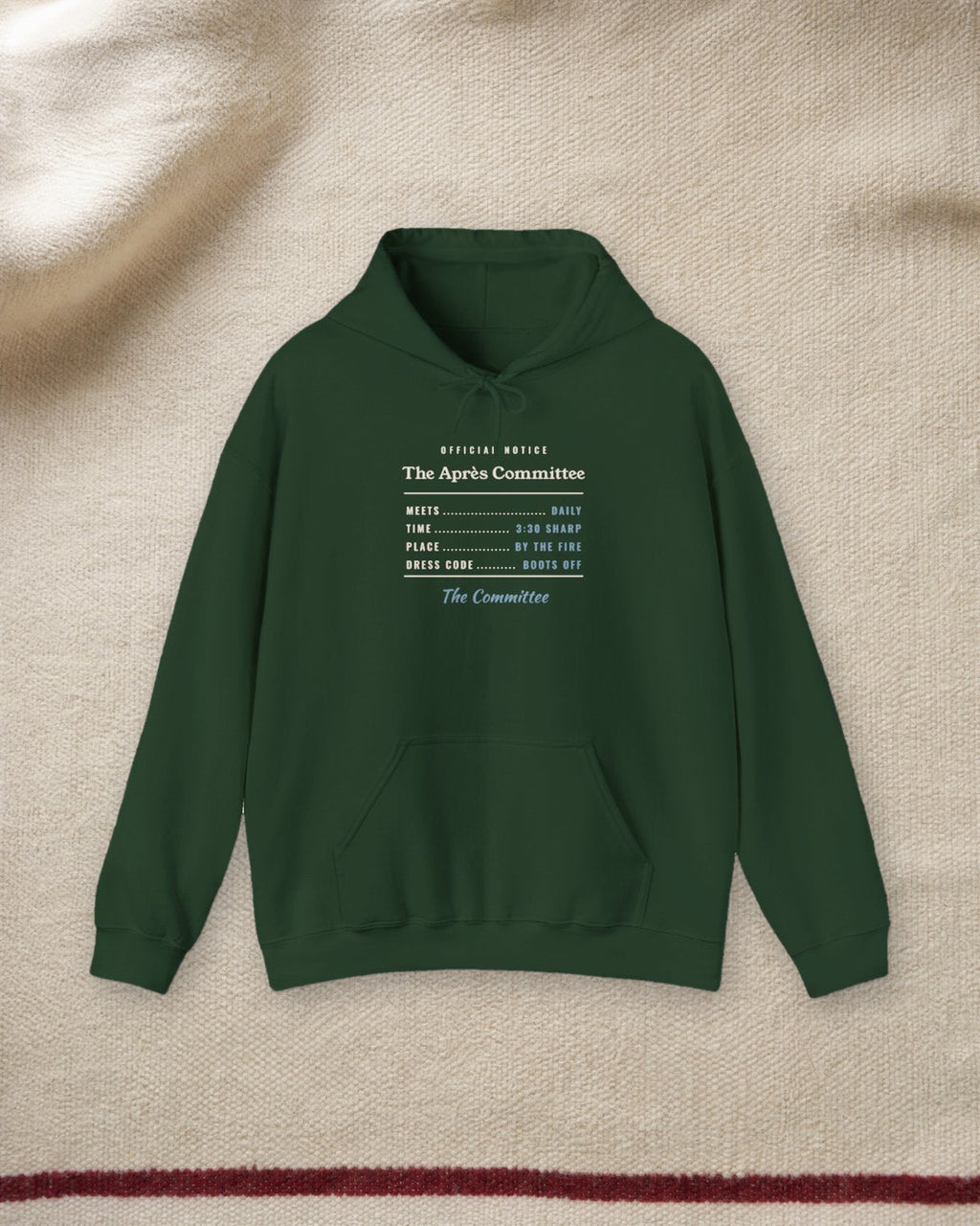 The Après Committee Hoodie in Forest Green, styled