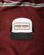 Après Hours Trucker Hat in Black/White, styled