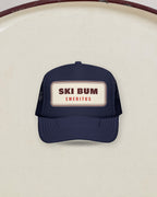 Ski Bum Emeritus Trucker Hat in Dark Navy, styled