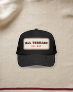 All Terrain Trucker Hat in Black, styled