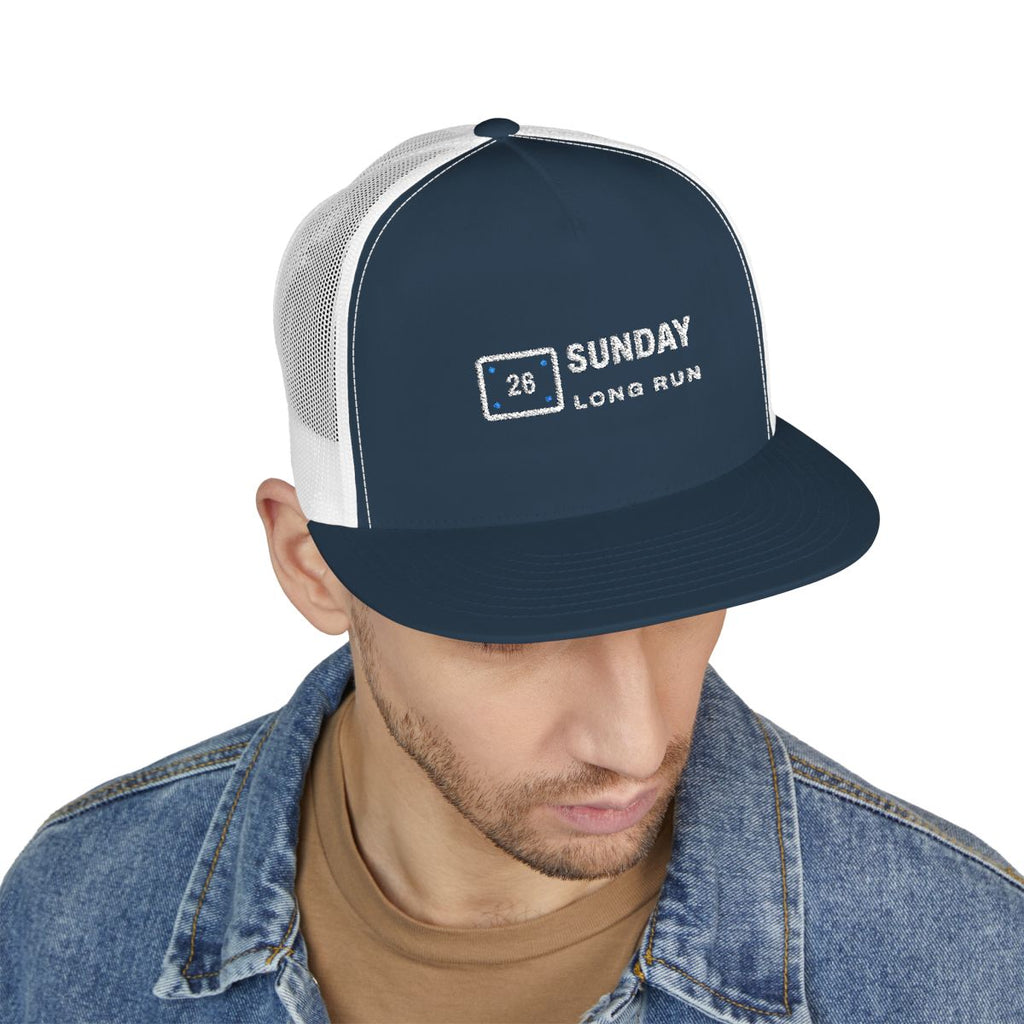Bib 26 Trucker Cap in Navy/White, on model