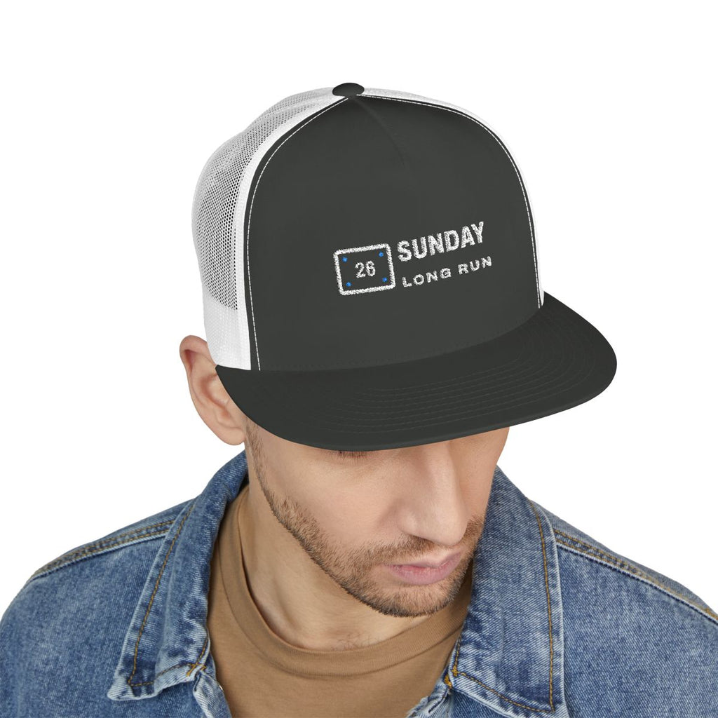 Bib 26 Trucker Cap in Charcoal/White, on model