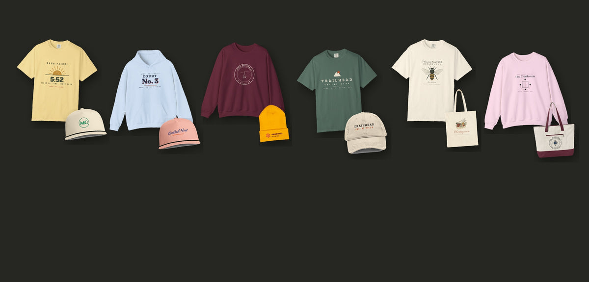 Common Field Co. clubs: Dawn Patrol Tee in Butter, Court No. 3 Hoodie in Light Blue, Après Department Crest Crewneck in Maroon, Club Wordmark Tee in Blue Spruce, Pollinator Department Tee in Ivory and The Charleston Crewneck in Light Pink, with a cap, beanie, tote or bag from each club