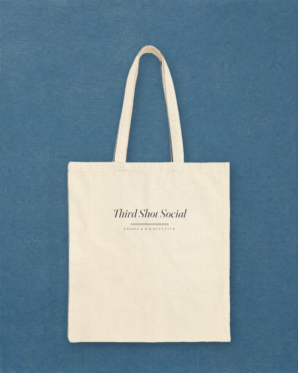 Club Wordmark Tote in Natural, styled