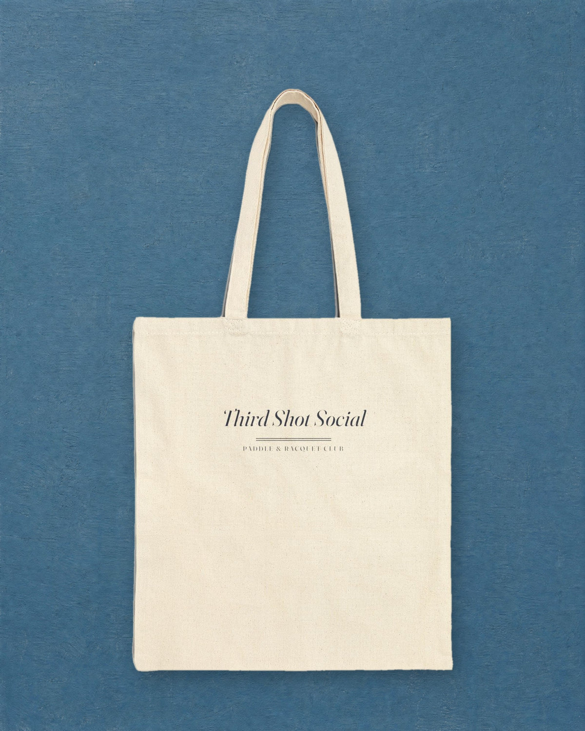 Club Wordmark Tote in Natural, styled
