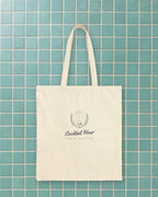 Cocktail Hour Coupe Tote in Natural, styled