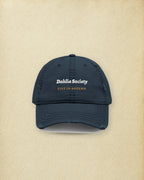 Dahlia Society Dad Hat in Dark Navy, styled
