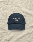 Raised Bed Club Dad Hat in Dark Navy, styled