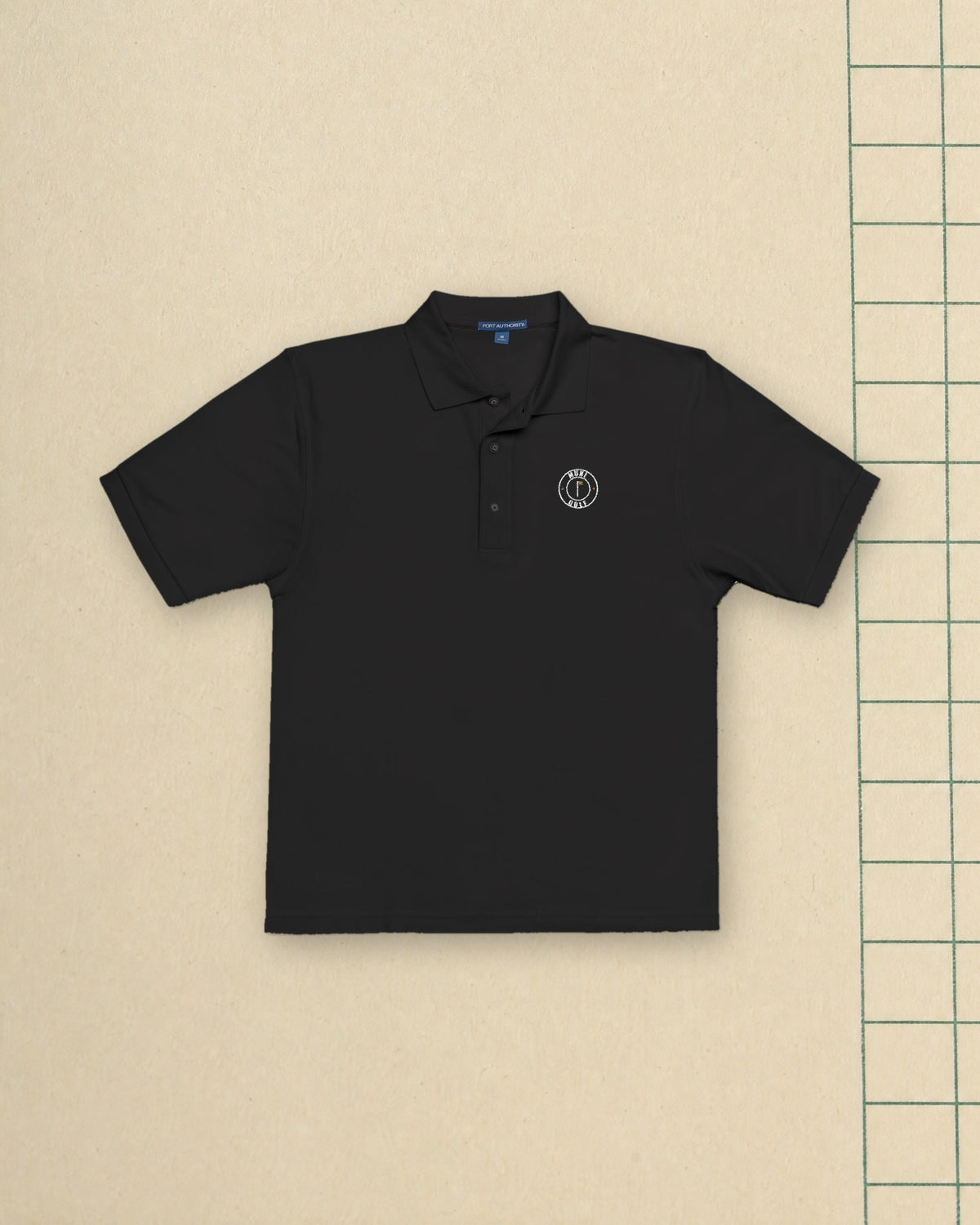 Muni Golf Seal Polo in Black, styled