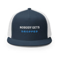 Nobody Gets Dropped Trucker Cap in Navy/White, front view