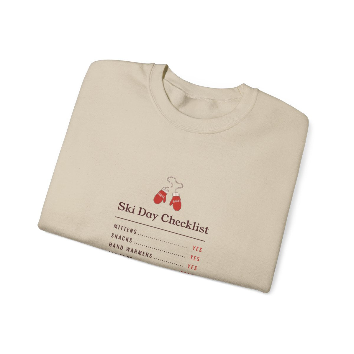 Ski Day Checklist Crewneck in Sand, folded