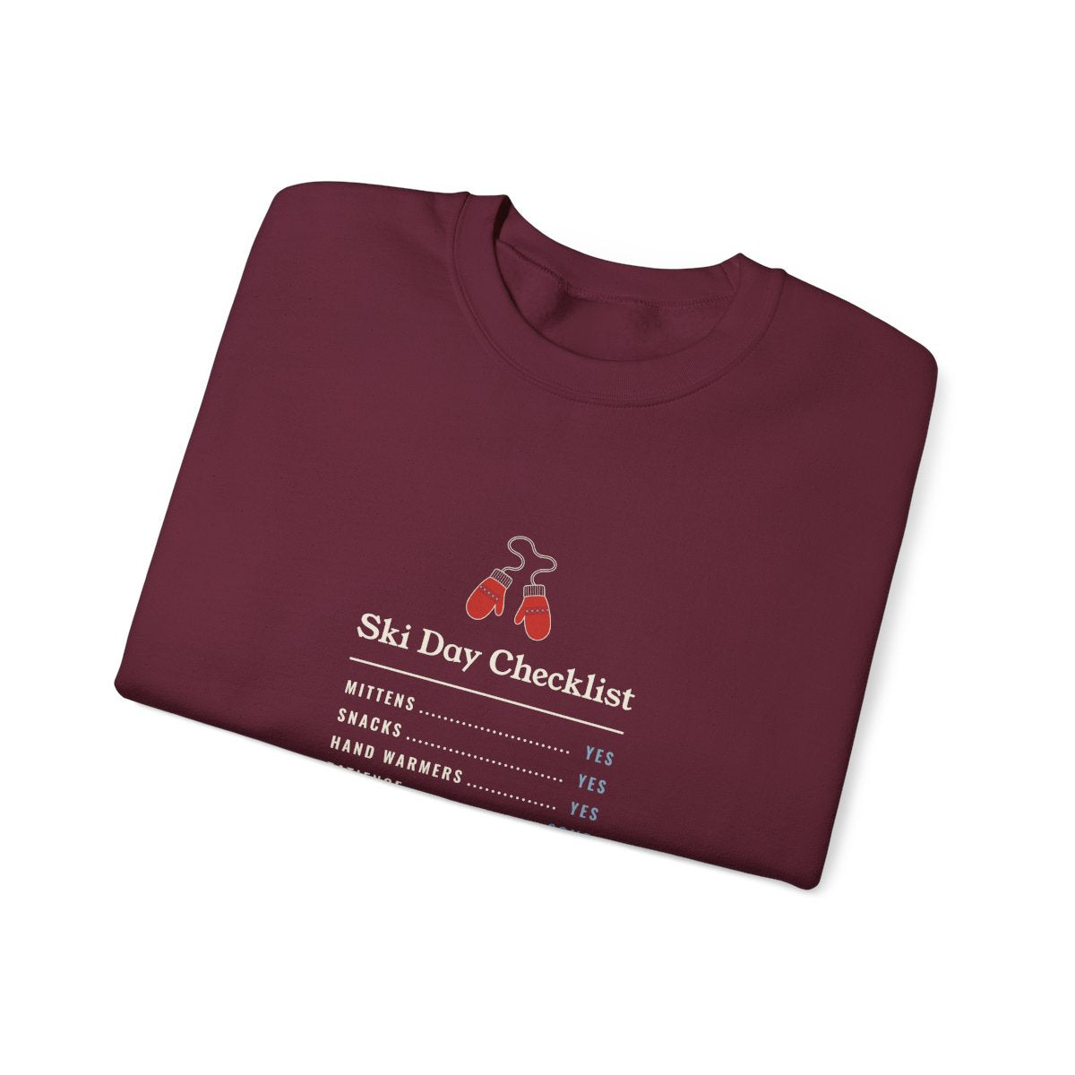 Ski Day Checklist Crewneck in Maroon, folded