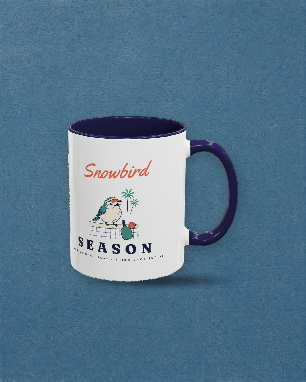 Snowbird Season Mug in Navy, styled