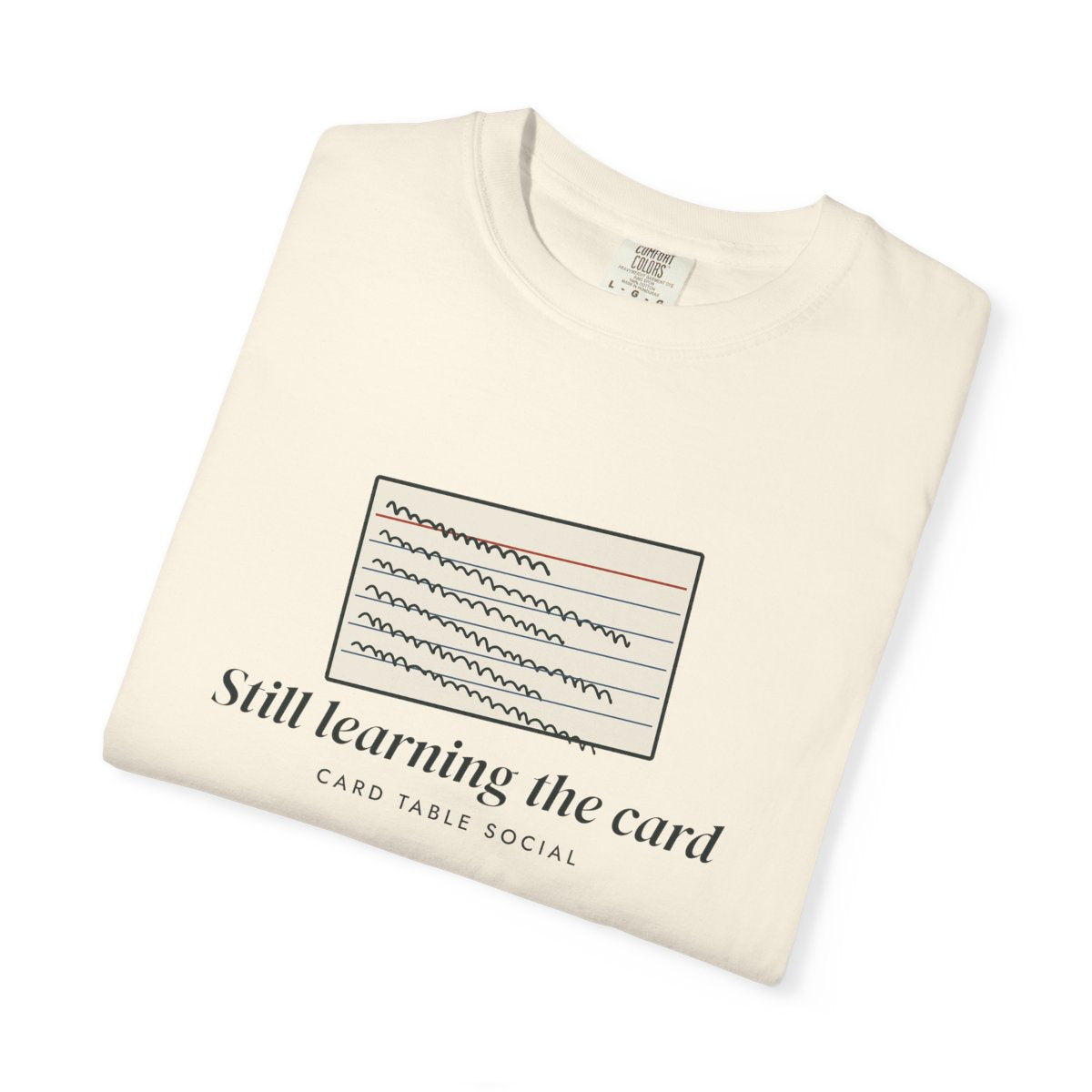 Still Learning the Card Tee in Ivory, folded