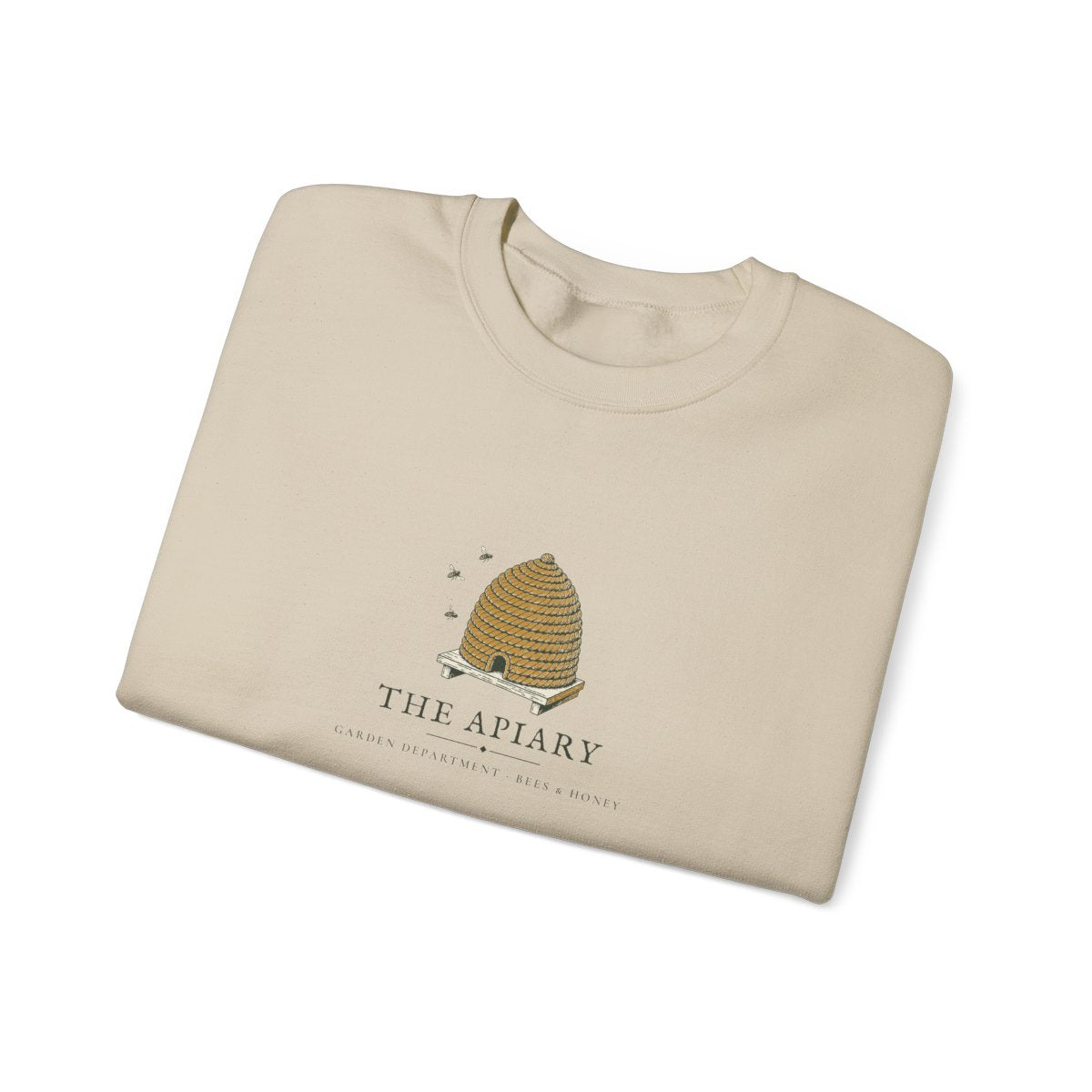 The Apiary Crewneck in Sand, folded