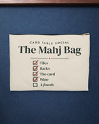 The Mahj Bag Zip Pouch in Black zipper, styled