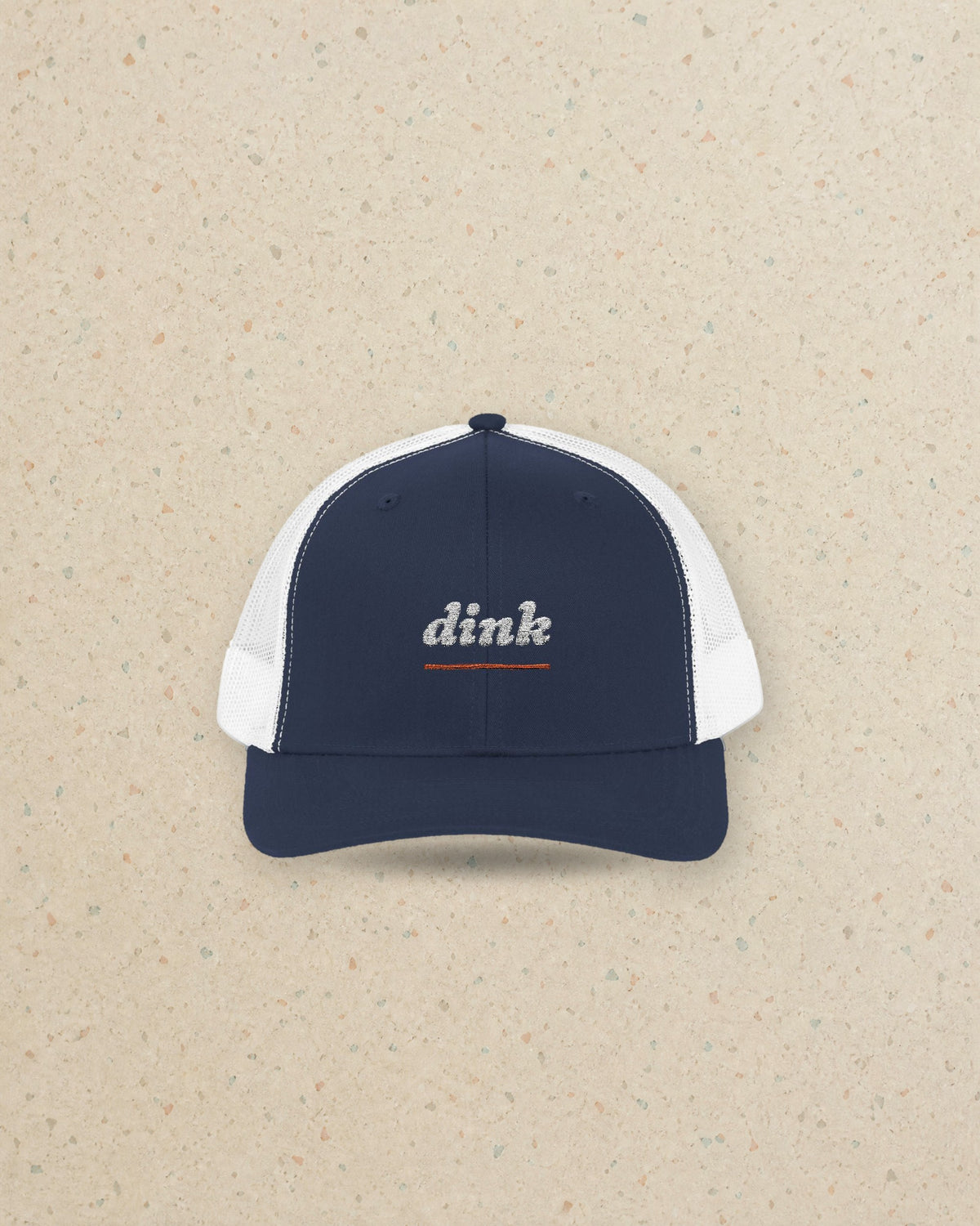 Dink Trucker Hat in Navy / White, styled