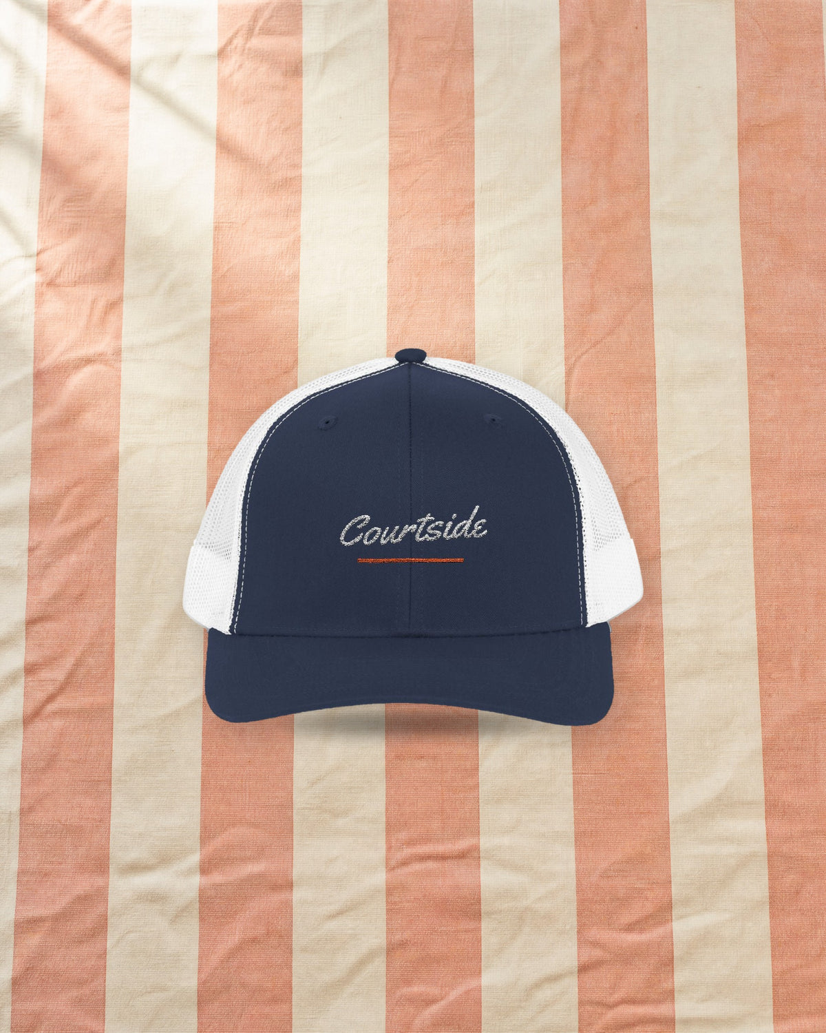 Courtside Trucker Hat in Navy / White, styled