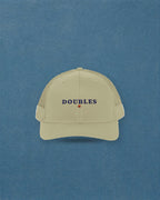 Doubles Trucker Hat in Khaki, styled