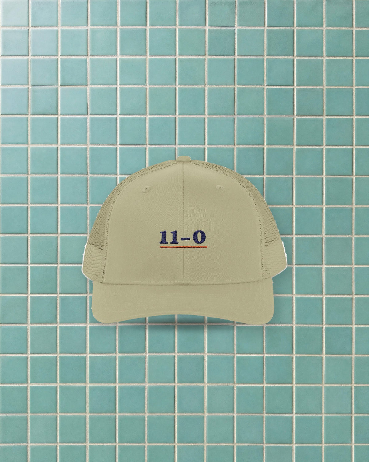 11–0 Trucker Hat in Khaki, styled