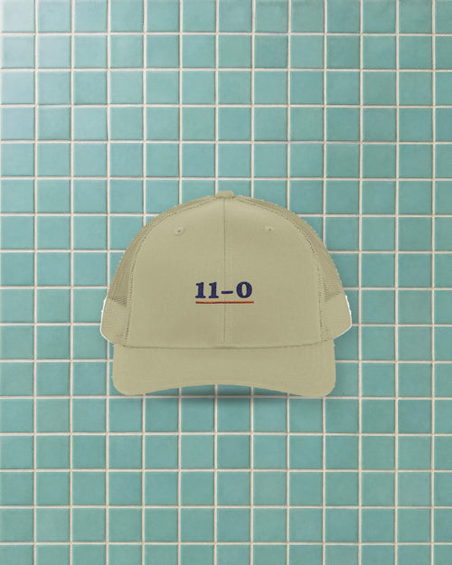 11–0 Trucker Hat in Khaki, styled