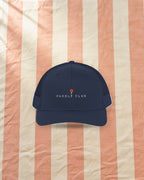 Paddle Club Trucker Hat in Navy, styled