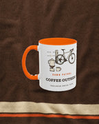 Coffee Outside Mug in Orange, styled