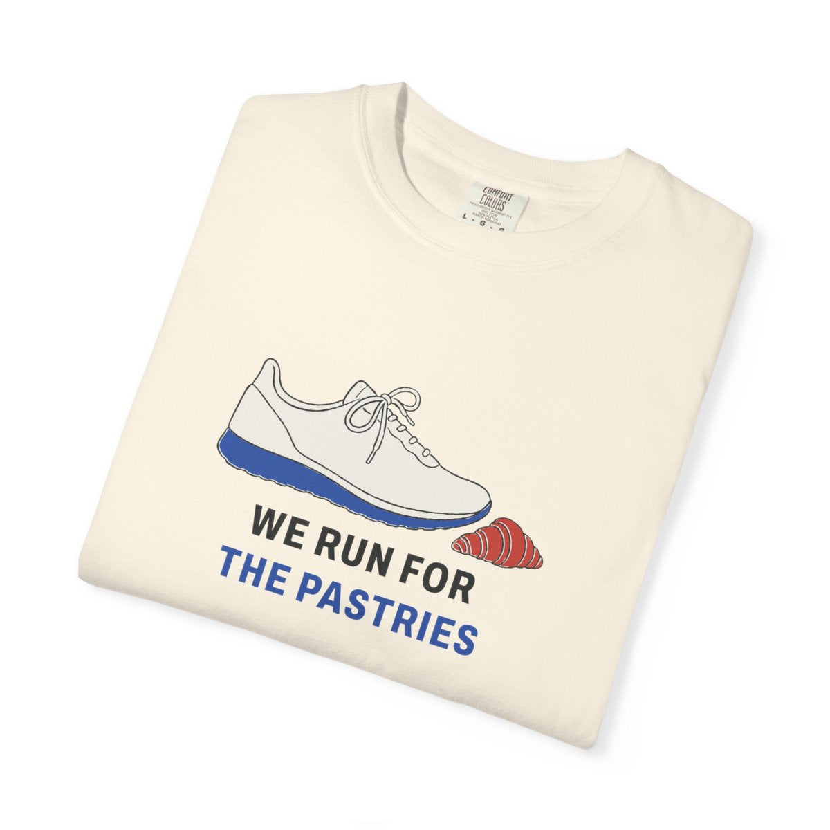 We Run for the Pastries Tee in Ivory, folded